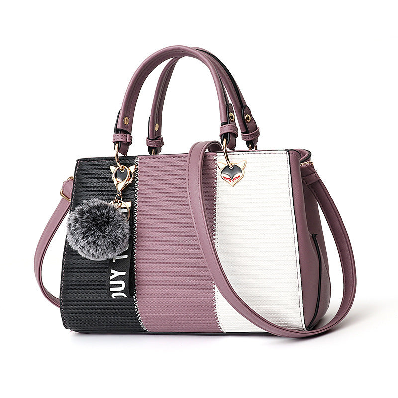 Women’s Patchwork Handbag with Hairball Ornament – Elegant Tote & Crossbody Shoulder Bag for Parties LONDYN UPBRINGING