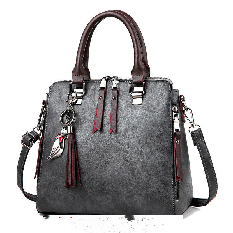 Vintage PU Leather Handbag for Women – Luxury Large Capacity Tote with Tassel & Top Handle Shoulder Bag LONDYN UPBRINGING