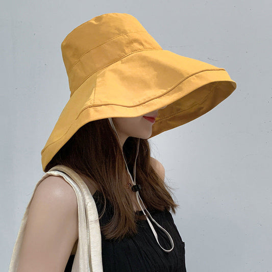 Women's Anti-UV Wide Brim Sun Hat | Foldable Cotton Bucket Hat for Travel & Beach LONDYN UPBRINGING